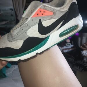 Nike Cream and Black Athletic Shoes with Teal Accents